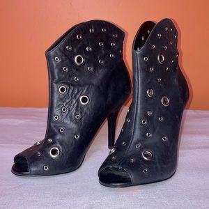 BCBG black leather heeled boots